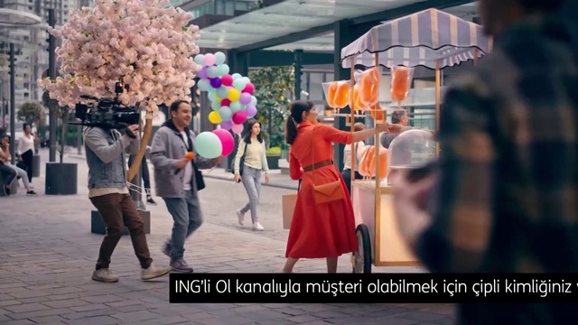 Video Reference: Balloon, Happy, Pink, Leisure, Street fashion, Social group, Public space, Fun, Recreation, City