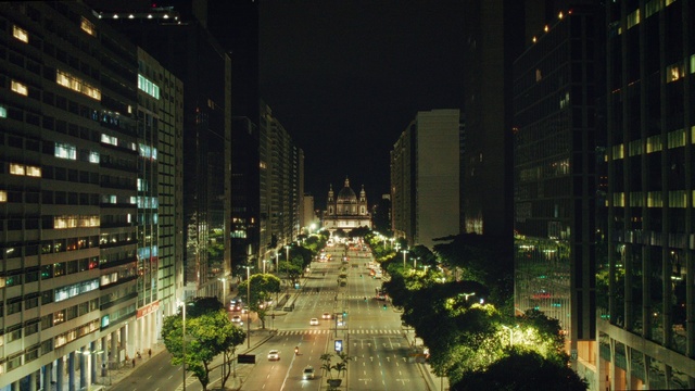 Video Reference: Building, Plant, Window, Skyscraper, Sky, Tower block, Tree, Tower, Urban design, Thoroughfare