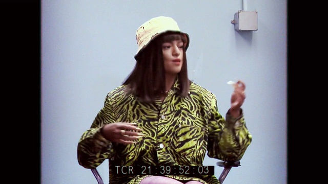 Video Reference: Arm, Sleeve, Gesture, Music, Cap, Flash photography, Jewellery, Fashion design, Fun, Music artist