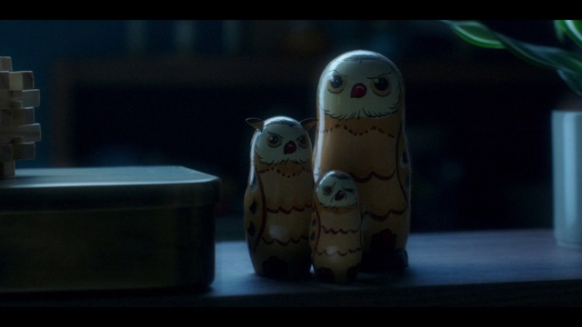 Video Reference: Gesture, Toy, Whiskers, Wood, Stuffed toy, Darkness, Drinkware, Night, Animated cartoon, Terrestrial animal