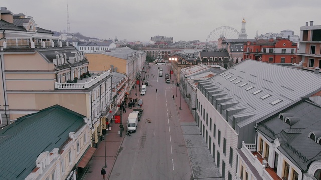 Video Reference: Sky, Daytime, Building, Window, Infrastructure, Urban design, Cloud, Neighbourhood, City, Residential area