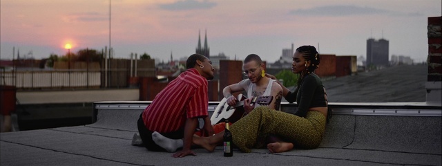 Video Reference: Sky, Cloud, Temple, Shorts, Travel, Luggage and bags, Happy, Leisure, Event, T-shirt