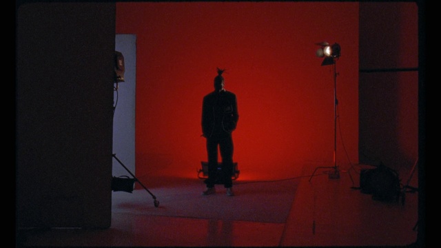 Video Reference: Sky, Sculpture, Orange, Art, Building, Tints and shades, Performing arts, Entertainment, Statue, Sunset