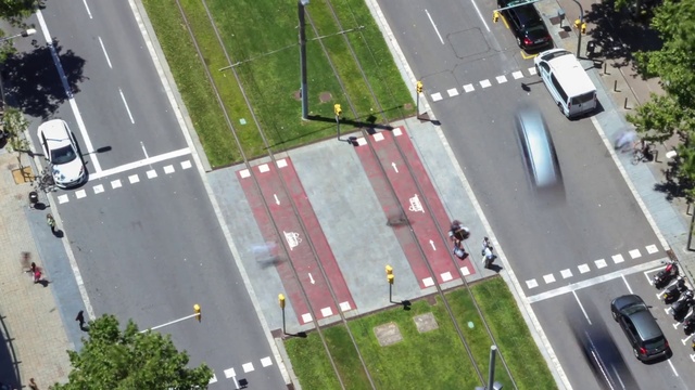 Video Reference: Car, Vehicle, Infrastructure, Road surface, Asphalt, Tree, Plant, Urban design, Line, Residential area