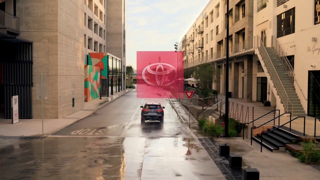 Video Reference: Land vehicle, Car, Window, Building, Plant, Vehicle, Tire, Road surface, Urban design, Wheel