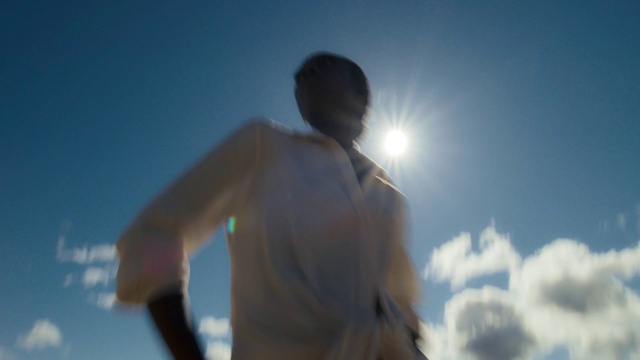 Video Reference: Sky, Cloud, People in nature, Flash photography, Gesture, Happy, Sunlight, Lens flare, Elbow, Horizon
