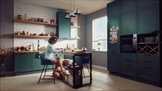 Video Reference: kitchen, interior, modern, teal cabinets, home, island, shelves, window, chair, appliances, cooking area, residential, design, minimal, person