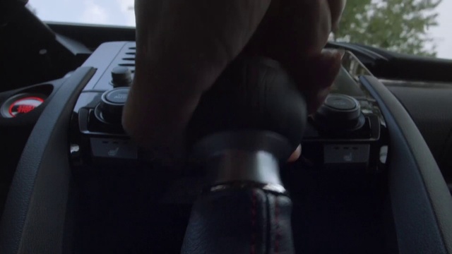 Video Reference: Gear shift, Automotive lighting, Automotive tire, Automotive mirror, Automotive design, Steering part, Motor vehicle, Steering wheel, Finger, Vehicle door