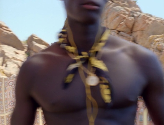 Video Reference: Sky, Neck, Recreation, Chest, Rope, Electric blue, Trunk, Barechested, Adventure, Fashion accessory