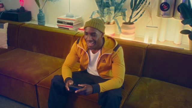 Video Reference: Comfort, Couch, Smile, Yellow, Houseplant, Cap, Leisure, Fun, Flooring, studio couch