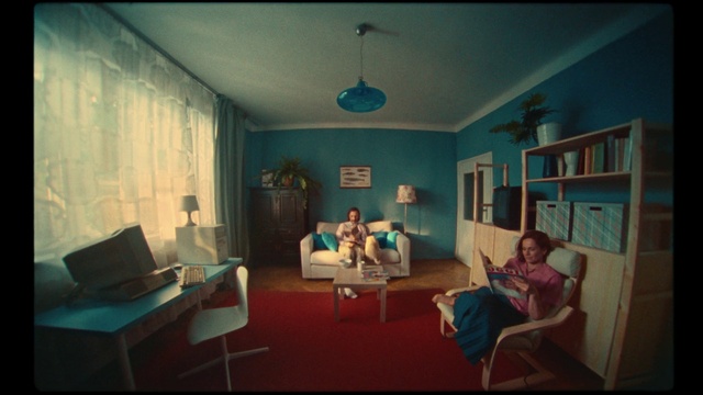 Video Reference: Furniture, Property, Picture frame, Table, Azure, Couch, Lighting, Comfort, Interior design, Lamp