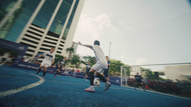 Video Reference: Cloud, Sky, Shorts, Building, Plant, Sports uniform, Asphalt, Sports equipment, Tree, Leisure