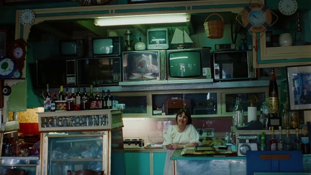 Video Reference: Drinkware, Barware, Bottle, Shelving, Building, Drinking establishment, Shelf, Home appliance, Picture frame, Countertop