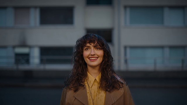 Video Reference: Smile, Lip, Shoulder, Window, Flash photography, Happy, Black hair, Fashion design, Tints and shades, Eyewear