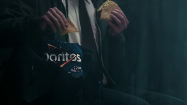 Video Reference: Hand, Sleeve, Gesture, Elbow, Electric blue, T-shirt, Font, Vehicle door, Windshield, Darkness