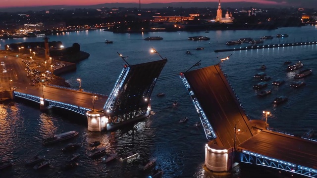 Video Reference: Water, Watercraft, Sky, Light, Building, Boat, Dusk, Architecture, Cityscape, Lake