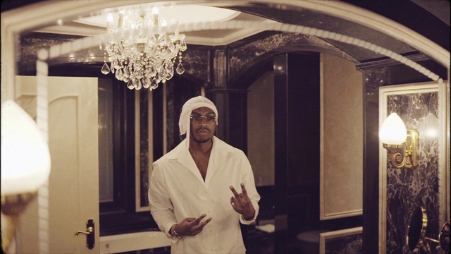 Video Reference: Sleeve, Decoration, Event, Ceiling, Cooking, Room, Chandelier, Flash photography, Chef, Light fixture