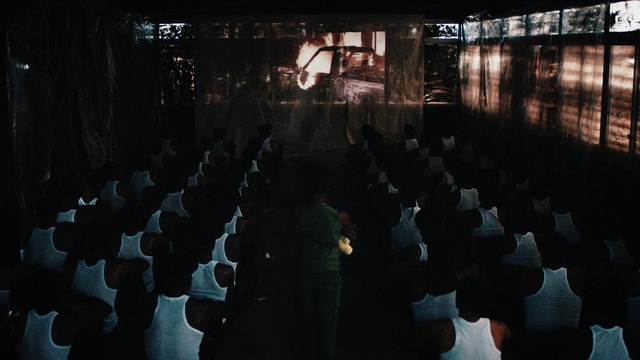 Video Reference: Chair, Entertainment, Event, Crowd, Stage, Projection screen, Darkness, Musical instrument accessory, Performing arts, Audience