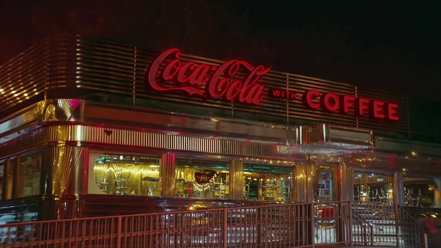 Video Reference: Building, Fence, Red, Door, Facade, Gas, Electronic signage, Event, City, Neon