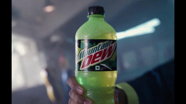 Video Reference: Bottle, Drink, Liquid, Alcoholic beverage, Soft drink, Carbonated soft drinks, Non-alcoholic beverage, Solution, Cola, Glass bottle
