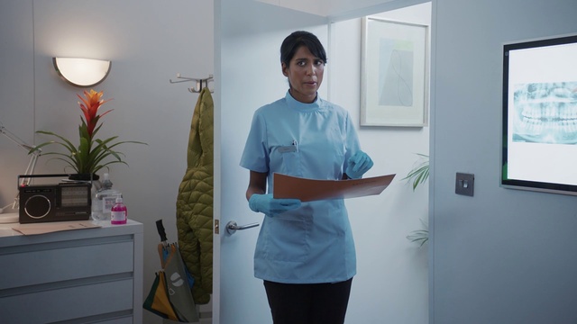 Video Reference: Shoulder, Cabinetry, Sleeve, Plant, Standing, Gesture, Houseplant, Window, Elbow, Picture frame