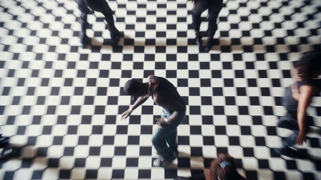 Video Reference: World, Flooring, Line, Floor, Font, Symmetry, Tints and shades, Pattern, Indoor games and sports, Entertainment