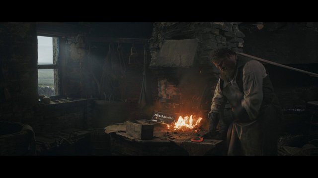 Video Reference: blacksmith, forge, fire, workshop, rustic, stone interior, metalworking, artisan, man, low light, interior, historic, tools, smoke, anvil