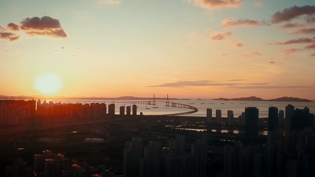 Video Reference: Cloud, Water, Sky, Atmosphere, Water resources, Light, Afterglow, Sunlight, Building, Sunset