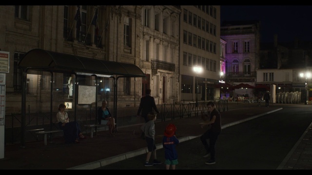 Video Reference: Window, Building, Road surface, Automotive lighting, Neighbourhood, Facade, City, Midnight, Tints and shades, Metropolitan area