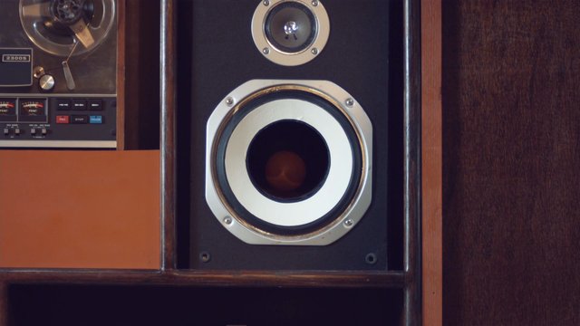 Video Reference: vintage audio, speaker, reel-to-reel, tape recorder, stereo equipment, wood cabinet, close-up, electronics, retro, sound system