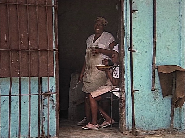 Video Reference: Leg, Door, Window, Standing, Tints and shades, Wood, Street fashion, Vintage clothing, Hat, Human leg