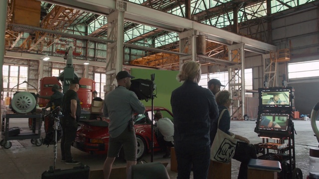 Video Reference: Wheel, Tire, Building, Engineering, Shorts, Machine, Event, Recreation, Factory, T-shirt