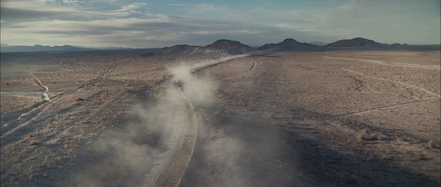 Video Reference: Cloud, Sky, Mountain, Slope, Road surface, Asphalt, Geological phenomenon, Landscape, Horizon, Aeolian landform