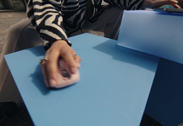 Video Reference: Sleeve, Automotive design, Table, Gesture, Wrist, Font, Nail, Thumb, Flooring, Knee