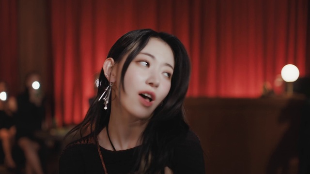 Video Reference: Lip, Flash photography, Eyelash, Curtain, Theater curtain, Entertainment, Audio equipment, Black hair, Event, Long hair