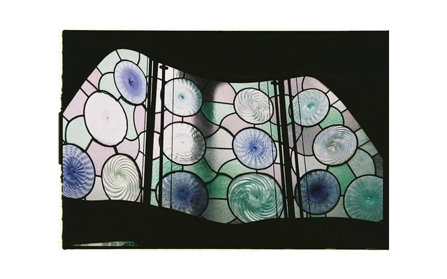 Video Reference: Rectangle, Sleeve, Fixture, Art, Font, Tints and shades, Stained glass, Circle, Pattern, Glass