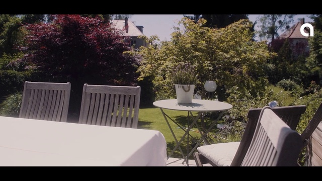 Video Reference: Table, Plant, Furniture, Property, Sky, Chair, Building, Outdoor furniture, Tree, Outdoor table