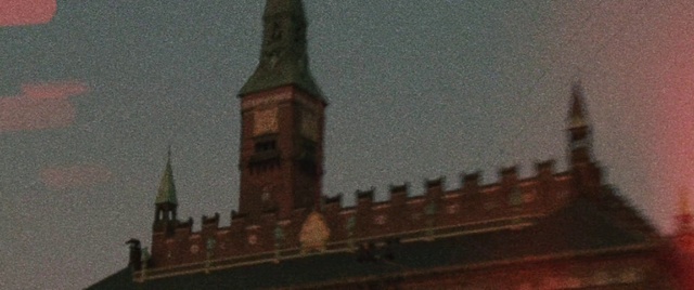 Video Reference: Sky, Window, Building, Atmospheric phenomenon, Tints and shades, Facade, Roof, Brickwork, Turret, Finial