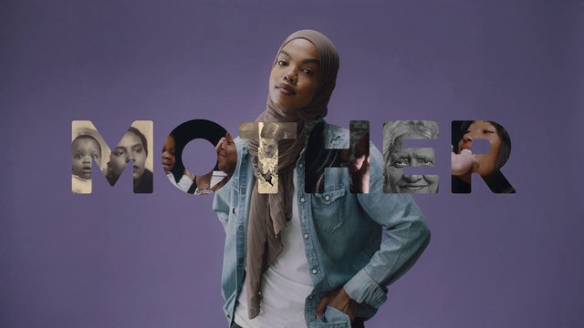 Video Reference: Purple, Gesture, Headgear, Art, Eyewear, Blazer, Fashion design, Event, Fictional character, Fun