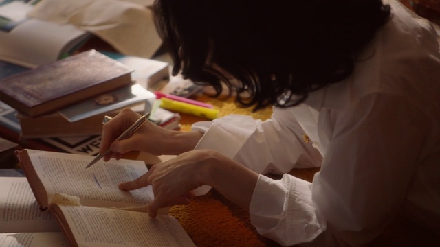 Video Reference: Office supplies, Writing implement, Finger, Writing instrument accessory, Nail, Pen, Homework, Writing, Child, Desk