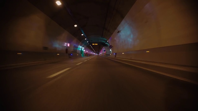 Video Reference: Brown, Automotive lighting, Road surface, Amber, Electricity, Asphalt, Headlamp, Thoroughfare, Tunnel, Road