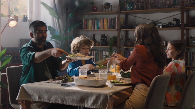 Video Reference: Table, Tableware, Bookcase, Picture frame, Shelf, Sharing, Food, Interior design, Houseplant, Chair