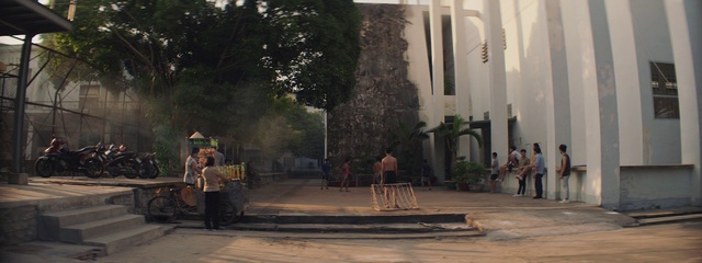 Video Reference: Building, Temple, Plant, Adaptation, Road surface, Morning, Tree, Leisure, City, Road