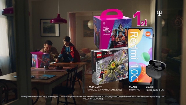 Video Reference: Table, Purple, Event, Magenta, T-shirt, Machine, Display device, Chair, Advertising, Room