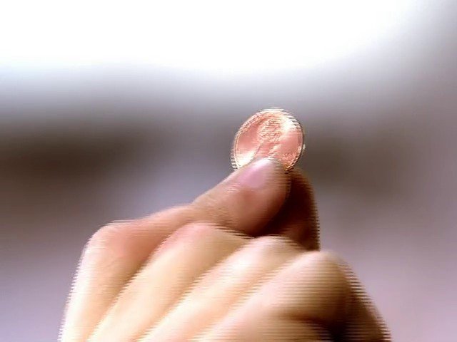 Video Reference: hand, coin, close-up, fingers, currency, money, macro, blurred background, object, holding