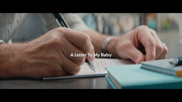 Video Reference: Hand, Finger, Gesture, Font, Writing instrument accessory, Gadget, Office supplies, Nail, Material property, Thumb