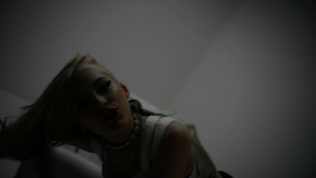 Video Reference: Arm, Mouth, Human body, Flash photography, Jaw, Eyelash, Gesture, Grey, Elbow, Audio equipment