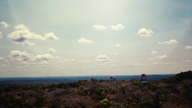 Video Reference: Cloud, Sky, Atmosphere, Plant, Natural landscape, Sunlight, Highland, Coastal and oceanic landforms, Cumulus, Terrain