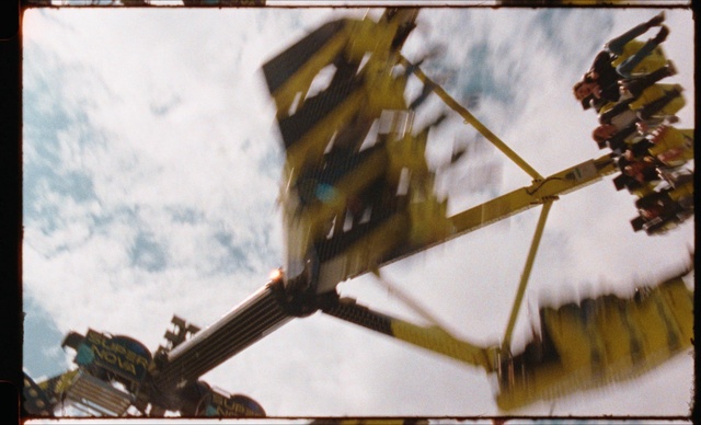Video Reference: Sky, Cloud, Wheel, Pole, Recreation, Amusement ride, Fun, Metal, Nonbuilding structure, Leisure