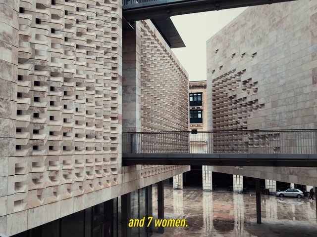 Video Reference: Daytime, Property, Building, Tower block, Brickwork, Urban design, Brick, Condominium, Rectangle, Sky